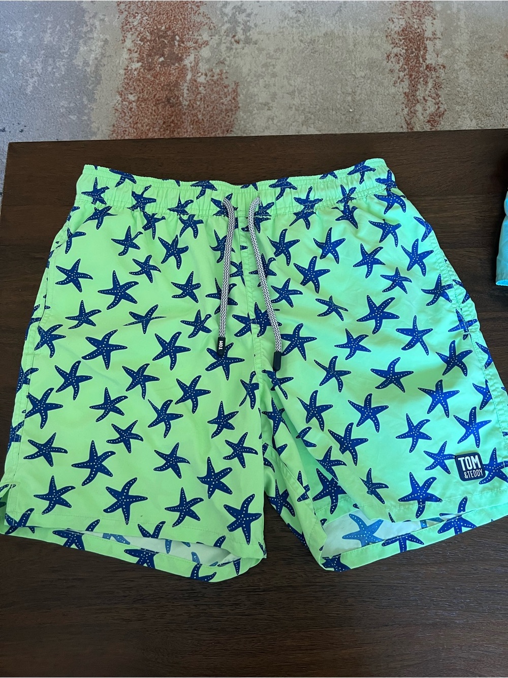Tom & Teddy SMALL Neon Green Swim Shorts with Navy Starfish Print